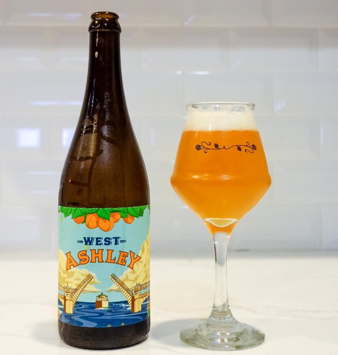 West Ashley has a unique packaging design featuring an image of a bridge that can be split in two - West Ashley: Apricot Blossoms in an Antique Wooden Barrel.