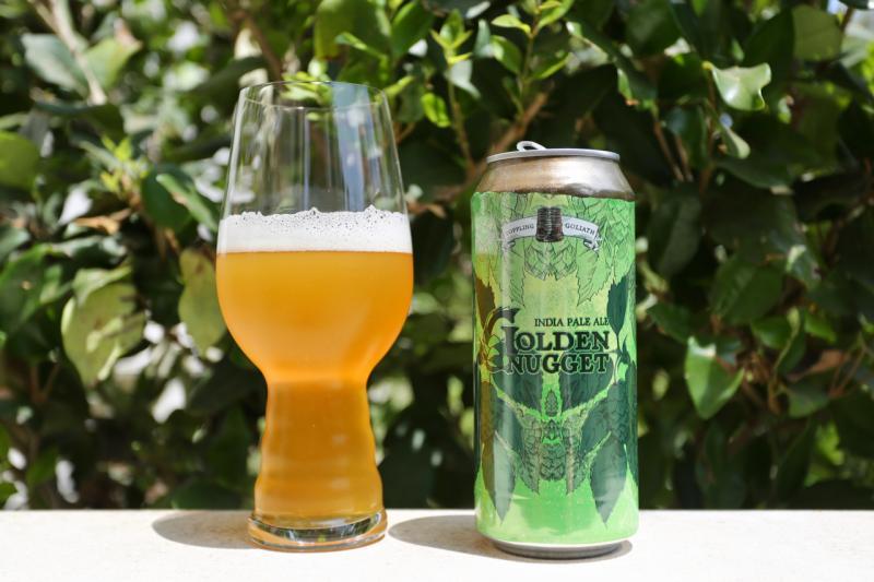 The beer has a cloudy, golden color, like a sunset - Golden Nugget: Taking Down the Giant with a Drop of Gold