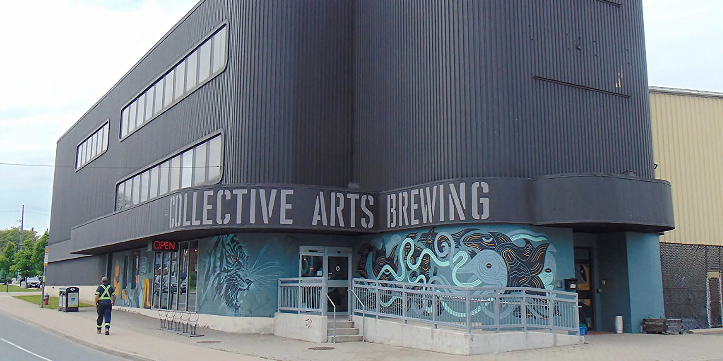 Exterior view of the modern and artistic Collective Arts Brewing factory - Jam Up The Mash: A Masterpiece of Seductive Sour Beer.