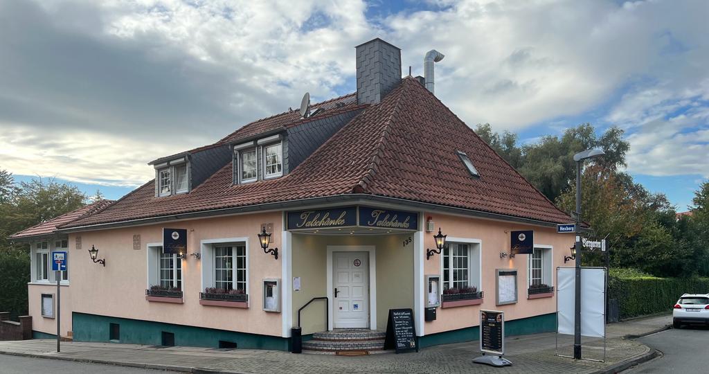 An exterior image of the Gasthausbrauerei Talschanke - Wöllnitzer Weißbier brewery: The Breath of the Ancient in a Glass of Beer
