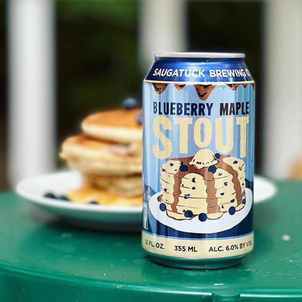 Close-up image of a Blueberry Maple Stout beer can with a fun, pastry-shaped design - Blueberry Maple Stout: Immerse Yourself in the Sweet Dark Night