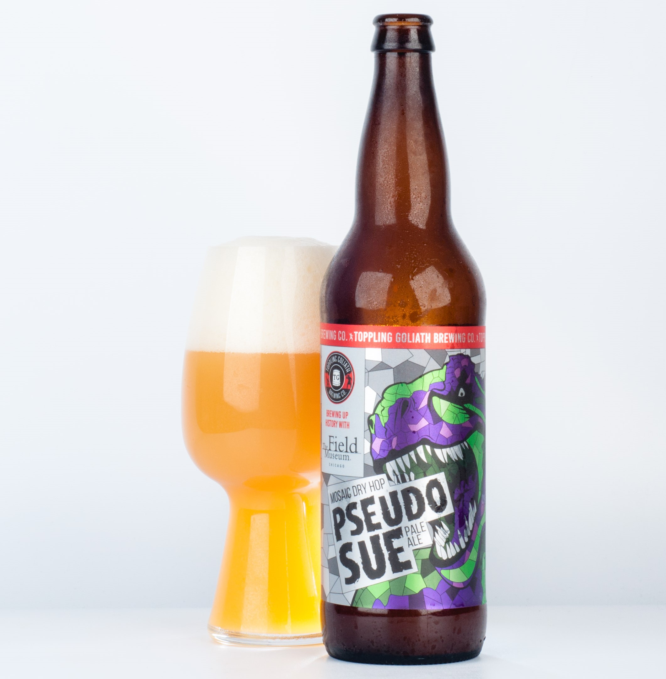 シュード・スーのビール瓶と、きめ細かな泡のついた琥珀色のビールのグラスの画像 - シュード・スー：黄金の霧とシトラのラブソング