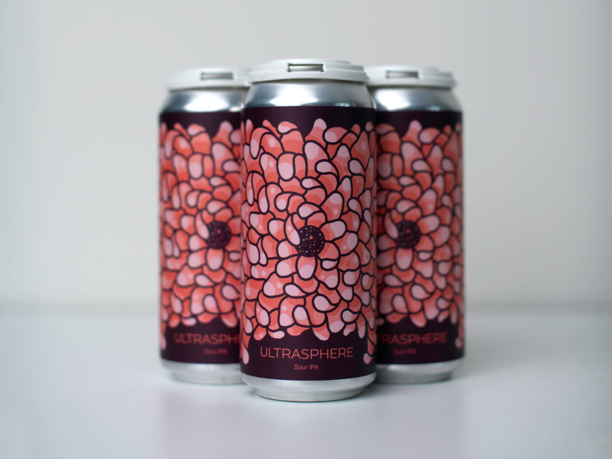 Ultrasphere: Flavors That Awaken All Your Senses A large Ultrasphere beer can with prominent floral motifs - Ultrasphere: A Flavor That Awakens All the Senses