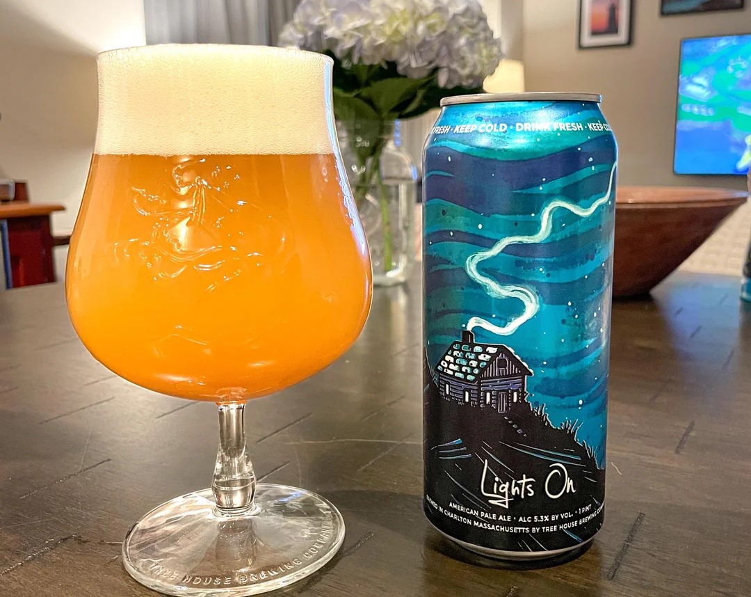 Lights On has a captivating, hazy yellow-black color scheme - Lights On: A Glass of Beer Shining Amidst the Misty Fog.