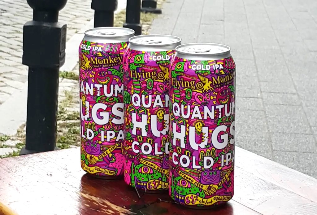 Quantum Hugs Cold IPA boasts a striking and eye-catching appearance with many vibrant colors - Quantum Hugs Cold IPA: Where Excellence is Encapsulated